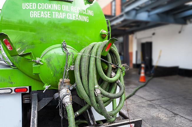 Grease Trap Cleaning of Queen Creek workers